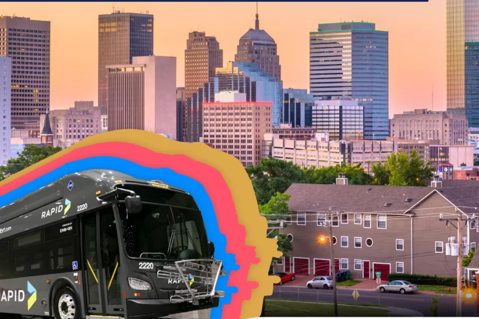 Graphic of gray Oklahoma City rapid bus against photo of Oklahoma City skyline